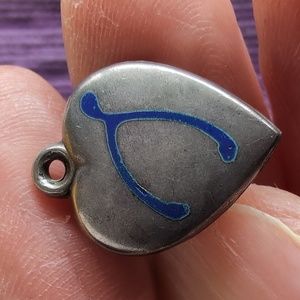 Antique sterling silver puffed heart charm